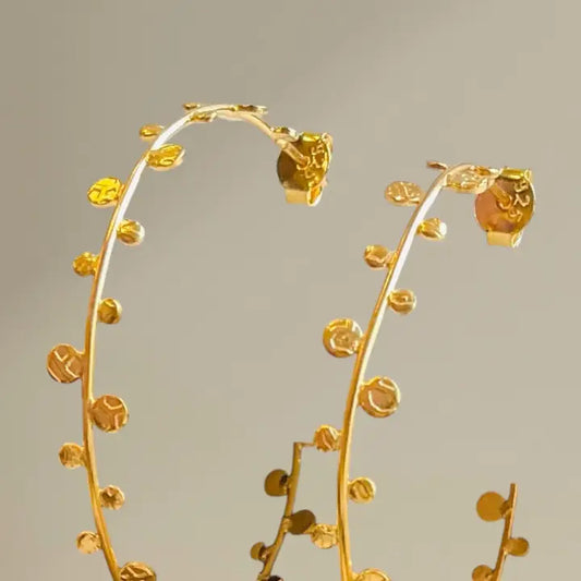 Hammered Disk Hoops in Gold and Silver
